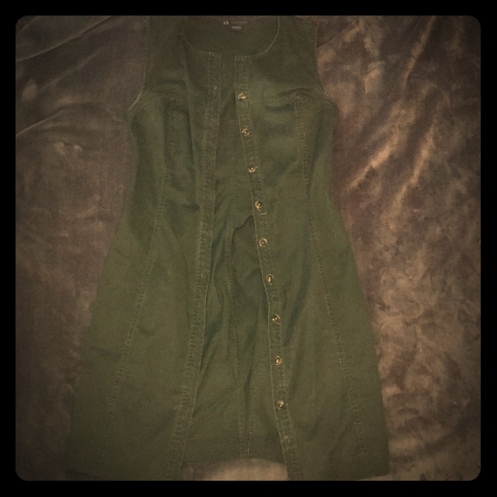 A dark green jacket/or dress.